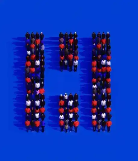 Employees standing in the shape of Letter H, showcasing the logo of hirdaramani